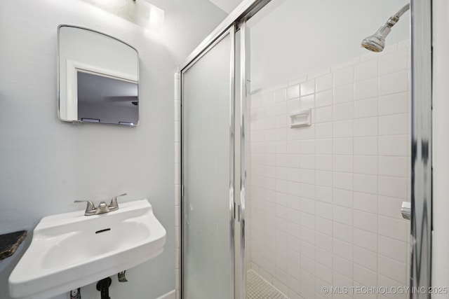 6922 E 16th St, Tulsa, OK 74112 - bathroom featuring a sink and a shower stall