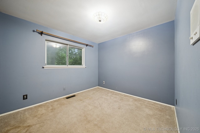 6922 E 16th St, Tulsa, OK 74112 - carpeted spare room with baseboards