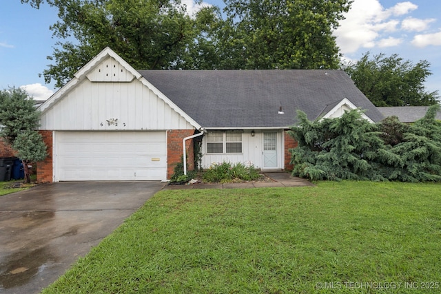 6922 E 16th St, Tulsa, OK 74112 - single story home featuring board and batten siding, a front lawn, an attached garage, and brick siding