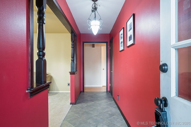 6922 E 16th St, Tulsa, OK 74112 - corridor with tile patterned floors and carpet floors
