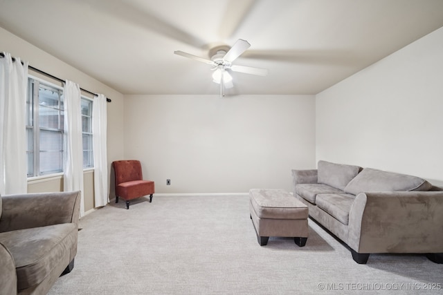 6922 E 16th St, Tulsa, OK 74112 - carpeted living area with a ceiling fan and baseboards