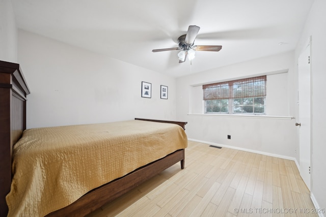 6922 E 16th St, Tulsa, OK 74112 - bedroom featuring light wood-type flooring and a ceiling fan