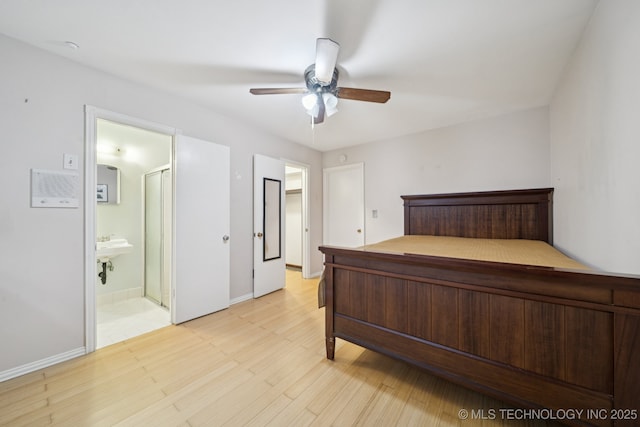 6922 E 16th St, Tulsa, OK 74112 - bedroom featuring ceiling fan, light wood-type flooring, and ensuite bath