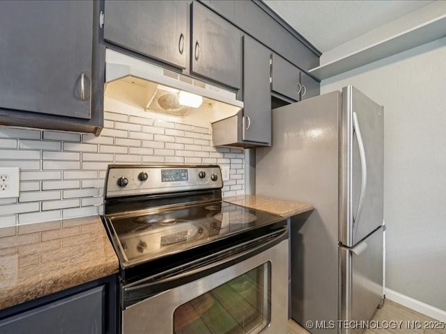 2346 S 118th E Ave, Tulsa, OK 74129 - kitchen featuring stainless steel appliances, decorative backsplash, and under cabinet range hood
