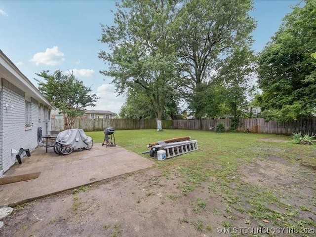 2346 S 118th E Ave, Tulsa, OK 74129 - fenced backyard featuring a patio area