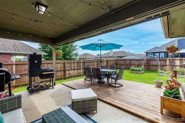 1113 S Spinnaker Dr, Oologah, OK 74053 - wooden terrace featuring outdoor dining area and a fenced backyard