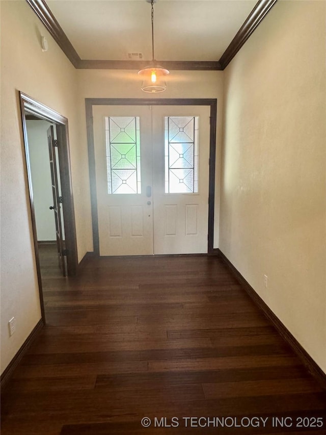 5510 Cooper Ct, Bartlesville, OK 74006 - entryway with ornamental molding and dark wood-type flooring