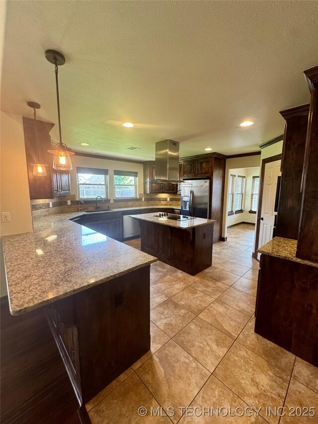 5510 Cooper Ct, Bartlesville, OK 74006 - kitchen with stainless steel appliances, island range hood, backsplash, a peninsula, and plenty of natural light