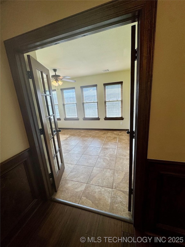 5510 Cooper Ct, Bartlesville, OK 74006 - hall featuring light tile patterned floors