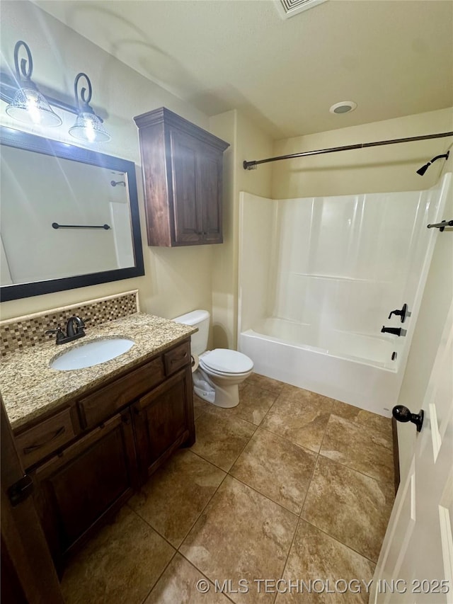 5510 Cooper Ct, Bartlesville, OK 74006 - bathroom featuring vanity, shower / bathtub combination, and tile patterned flooring