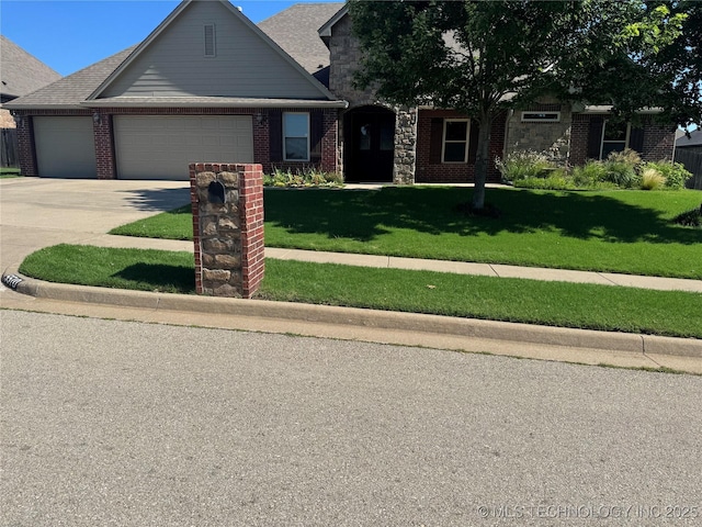 5510 Cooper Ct, Bartlesville, OK 74006 - traditional-style home with an attached garage, a front lawn, brick siding, and driveway