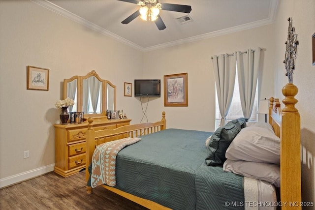 129 Highland Dr, Durant, OK 74701 - bedroom with wood finished floors, ornamental molding, and ceiling fan