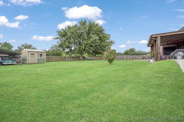 129 Highland Dr, Durant, OK 74701 - fenced backyard with a shed