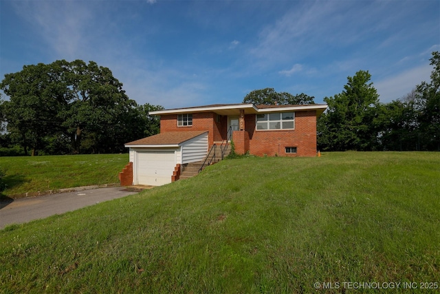 7266 S 58th W Ave, Tulsa, OK 74131 - view of front of property featuring brick siding, driveway, and a front yard