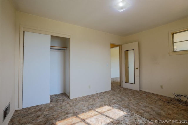 7266 S 58th W Ave, Tulsa, OK 74131 - unfurnished bedroom featuring carpet and a closet