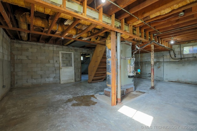 7266 S 58th W Ave, Tulsa, OK 74131 - unfinished basement featuring stairs and concrete block wall