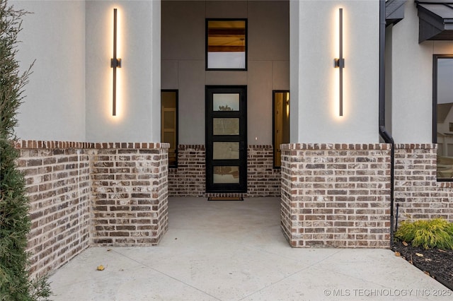 4708 S Sequoia Ave, Broken Arrow, OK 74011 - doorway to property with brick siding and stucco siding