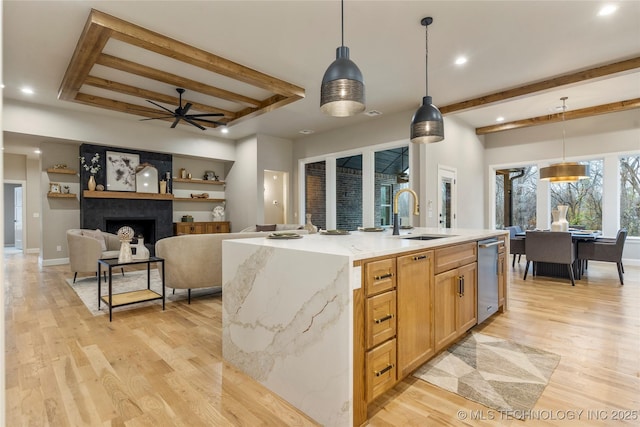 4708 S Sequoia Ave, Broken Arrow, OK 74011 - kitchen featuring beam ceiling, light wood finished floors, ceiling fan, stainless steel dishwasher, and hanging light fixtures