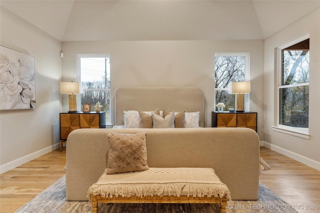 4708 S Sequoia Ave, Broken Arrow, OK 74011 - bedroom with vaulted ceiling and wood finished floors