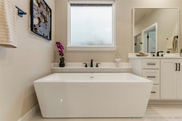 4708 S Sequoia Ave, Broken Arrow, OK 74011 - bathroom featuring a freestanding bath and vanity