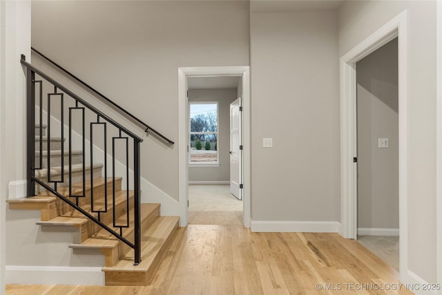 4708 S Sequoia Ave, Broken Arrow, OK 74011 - stairway with wood finished floors and baseboards