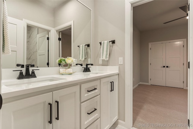 4708 S Sequoia Ave, Broken Arrow, OK 74011 - bathroom with double vanity and a ceiling fan