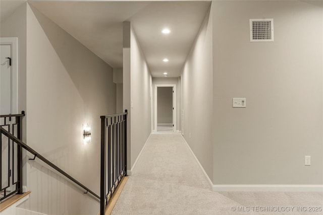 4708 S Sequoia Ave, Broken Arrow, OK 74011 - hall with an upstairs landing, light colored carpet, and recessed lighting