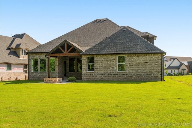 4708 S Sequoia Ave, Broken Arrow, OK 74011 - back of property with brick siding, a yard, and a shingled roof