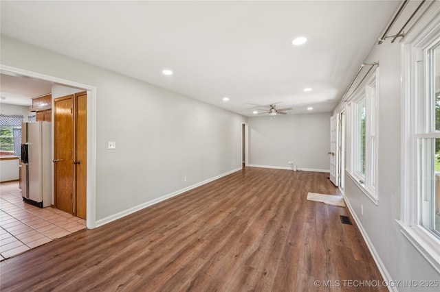 1013 N Main St, Sand Springs, OK 74063 - spare room featuring a ceiling fan, wood finished floors, and recessed lighting