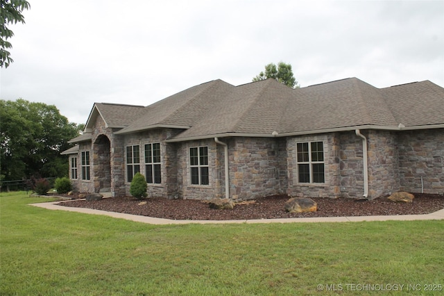 2148 E Wise Rd, Mcalester, OK 74501 - view of property exterior with stone siding, roof with shingles, and a lawn