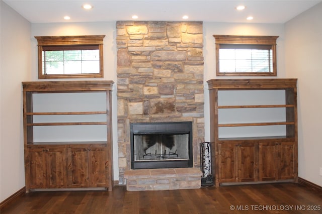 2148 E Wise Rd, Mcalester, OK 74501 - unfurnished living room featuring wood finished floors, recessed lighting, and a stone fireplace