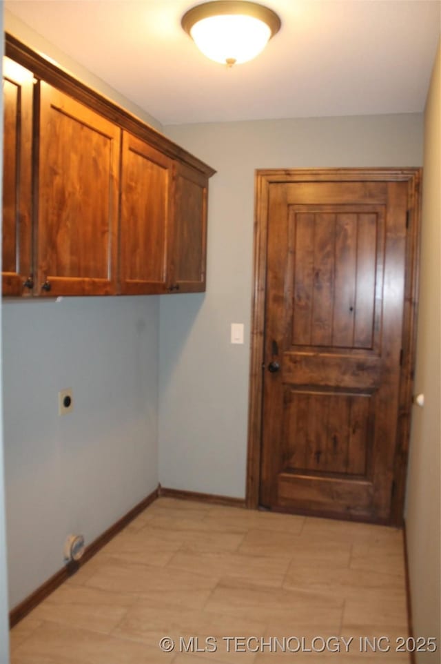 2148 E Wise Rd, Mcalester, OK 74501 - laundry area featuring cabinet space and hookup for an electric dryer