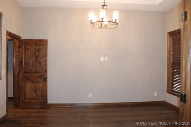 2148 E Wise Rd, Mcalester, OK 74501 - unfurnished room featuring a chandelier and wood finished floors