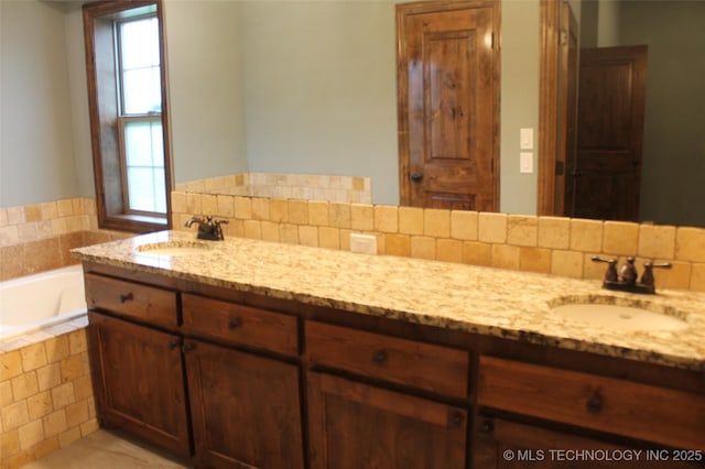 2148 E Wise Rd, Mcalester, OK 74501 - full bath featuring double vanity, healthy amount of natural light, and a bath