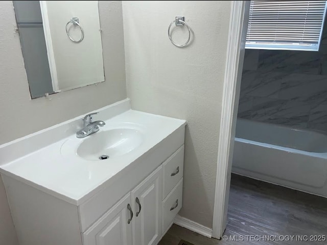 1824 S 119th E Ave, Tulsa, OK 74128 - bathroom featuring vanity and wood finished floors