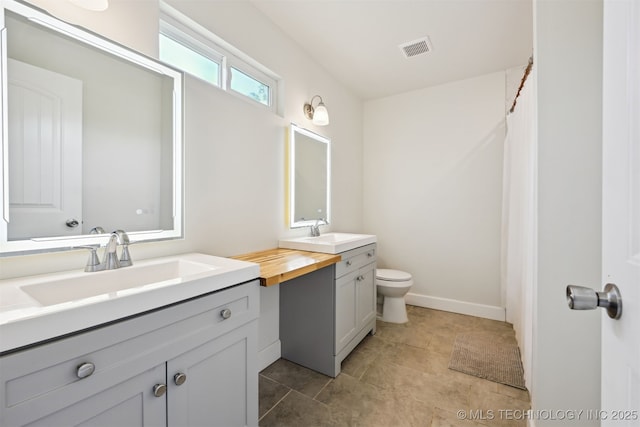 3608 S 31st W Ave, Tulsa, OK 74107 - full bathroom featuring vanity and toilet
