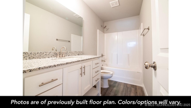 1441 E 149th Pl S, Glenpool, OK 74033 - bathroom with wood finished floors, vanity, and shower / tub combination
