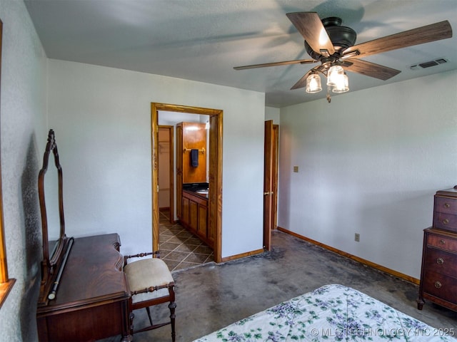 447 Pink Gladiola St, Broken Bow, OK 74745 - bedroom with connected bathroom and ceiling fan