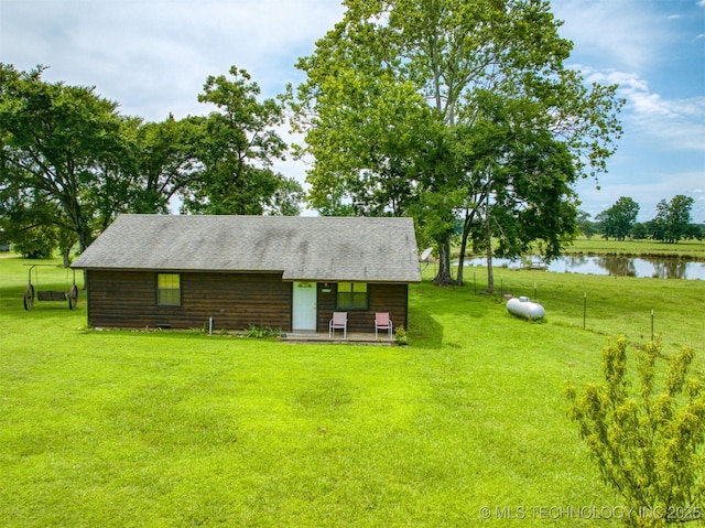 447 Pink Gladiola St, Broken Bow, OK 74745 - view of green lawn with a water view