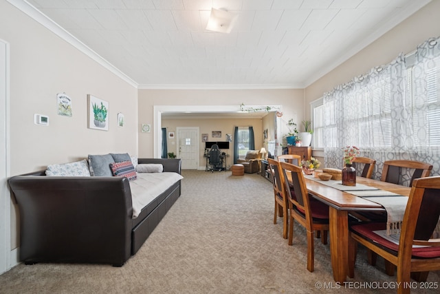 805 W Gentry St, Henryetta, OK 74437 - carpeted dining space with ornamental molding