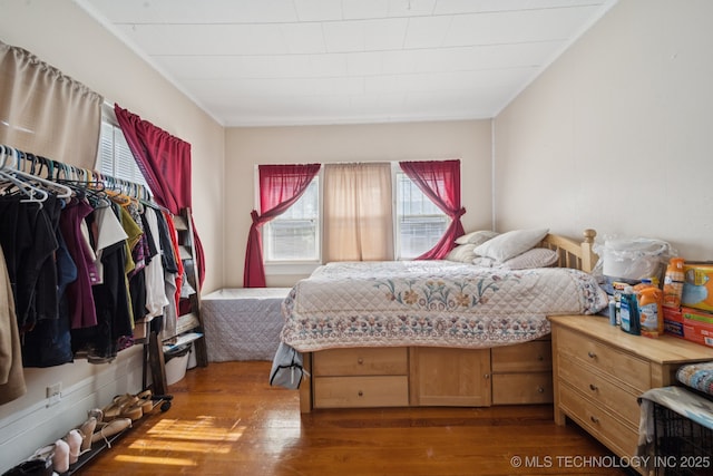 805 W Gentry St, Henryetta, OK 74437 - bedroom featuring wood finished floors