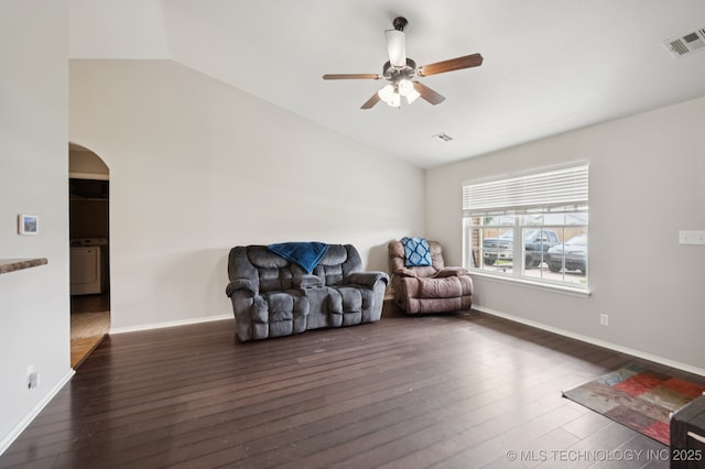 8661 S 264th E Ave, Broken Arrow, OK 74014 - living area featuring arched walkways, ceiling fan, vaulted ceiling, hardwood / wood-style floors, and washer / clothes dryer