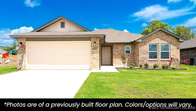 219 S 25th St, Collinsville, OK 74021 - single story home featuring driveway, brick siding, a front yard, a garage, and roof with shingles