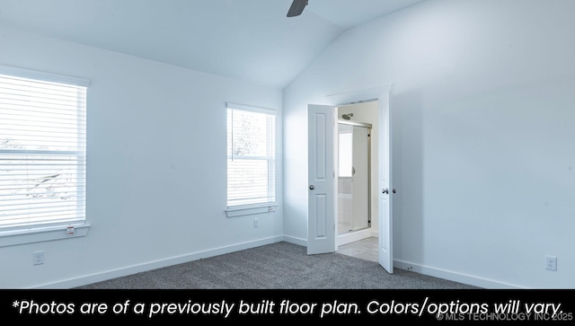 219 S 25th St, Collinsville, OK 74021 - unfurnished bedroom featuring carpet flooring, vaulted ceiling, and a ceiling fan
