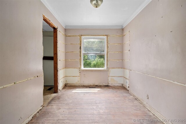 917 N Knoxville Ave, Tulsa, OK 74115 - unfurnished room featuring crown molding