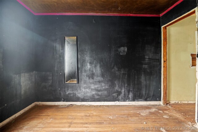 917 N Knoxville Ave, Tulsa, OK 74115 - unfurnished room with wood finished floors