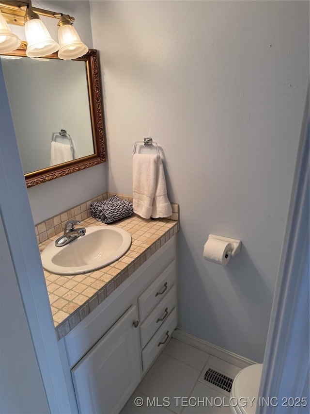 450779 E 341st Rd Unit 34, Afton, OK 74331 - half bathroom with vanity and tile patterned flooring