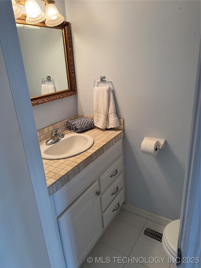 450779 E 341st Rd Unit 34, Afton, OK 74331 - half bath with vanity and tile patterned floors