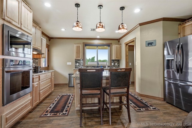 13514 N 97th E Ave, Collinsville, OK 74021 - kitchen featuring appliances with stainless steel finishes, ornamental molding, dark wood finished floors, light brown cabinetry, and tasteful backsplash