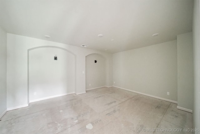 16817 E 41st Pl S, Tulsa, OK 74134 - empty room with arched walkways and baseboards